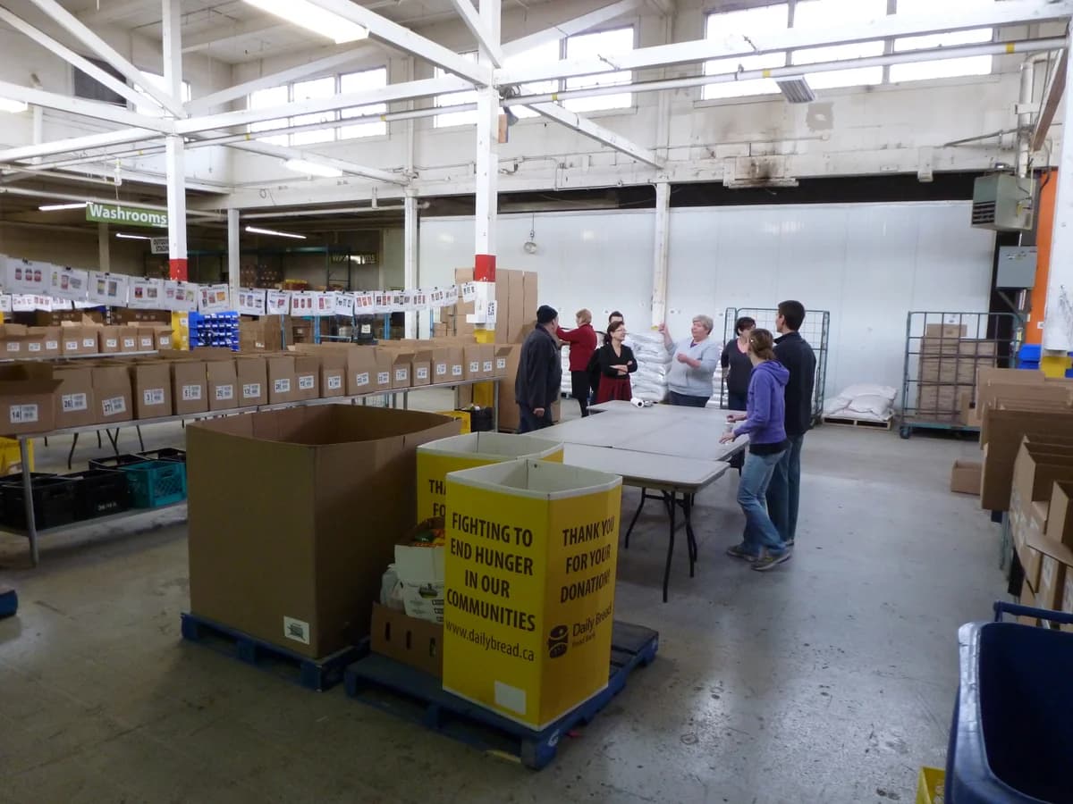 Volunteers preparing food packages at the Daily Bread Food Bank in Toronto